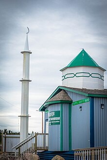 Midnight Sun Mosque in Inuvik, which led Amier Suliman to remark: "This is the first minaret to be erected in the Arctic ...some will say it's a new frontier for Islam". Midnight Sun Mosque in Inuvik, NWT.jpg