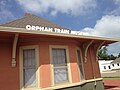 Another sign along the roof of the station