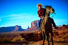 A Navajo man on horseback in Monument Valley, Arizona, United States Navajo Cowboy-1.jpg