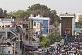 People eagerly await atop their houses to witness the Rath Yatra procession