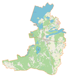 Mapa konturowa gminy Pisz, u góry znajduje się owalna plamka nieco zaostrzona i wystająca na lewo w swoim dolnym rogu z opisem „Śniardwy”