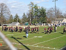 The Pitman Panthers run across Davis Field after defeating the Clayton Clippers at the 2020 Thanksgiving football game Pitman Panthers Win the 2020 Thanksgiving Game.jpg