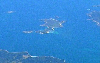 Night Island is the tiny island on the top left of this picture of Preservation Island Preservation Island aerial.jpg