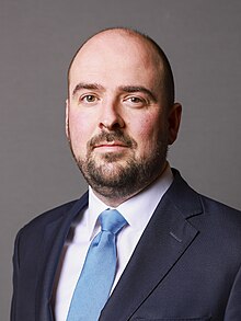 Richard Holden Official Cabinet Portrait, November 2023 (cropped).jpg