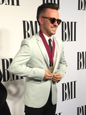 Ricky Reed (pictured in 2015) is the executive producer for Thank You. Ricky Reed 2015 BMI Pop Awards.png