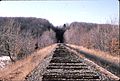 Roseville Tunnel looking west about five years after the tracks were removed. The hill above the tunnel has been partially blasted away, part of the original aborted plan to create Roseville Cut.