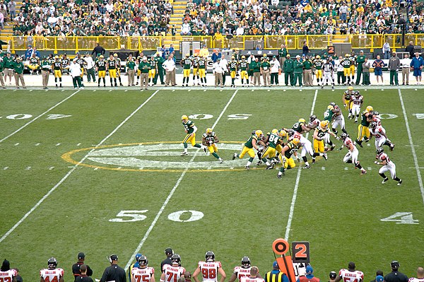 Aaron Rodgers hands off to Ryan Grant in Green Bay's week 5 encounter against the Atlanta Falcons