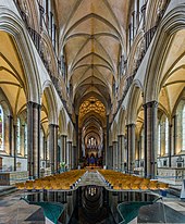 The nave, with William Pye's decorative font visible in the foreground Salisbury Cathedral Nave, Wiltshire, UK - Diliff.jpg
