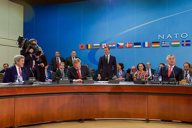 File:Secretary Kerry and Montenegrin Prime Minister Djukanovic Watch as Norwegian Foreign Minister Brende Signs an Accession Protocol to Continue Montenegro's Admission to NATO in Brussels (27045333601).jpg