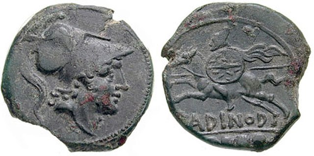 A Roman coin issued during the Second Punic War (218–201 BC) showing (obverse) the god of war Mars and (reverse) probably the earliest image of a Roma