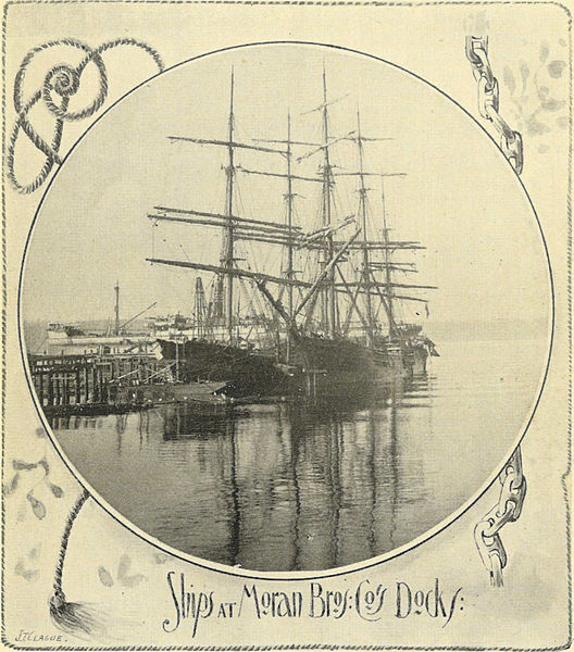 Two tall ships at the Moran Bros. Company docks, late 19th century