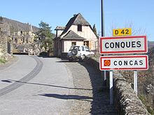 Conques/Concas : ŝildo en du lingvoj (franca, okcitana)