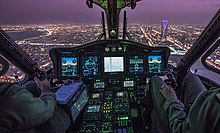 Sikorsky S-92 inflight over Riyadh at night.jpg