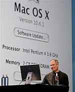 Steve Jobs reveals Mac OS X running on Pentium 4 hardware. Steve Jobs Presentation 2.jpg