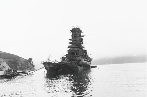 The rebuilt battlecruiser Haruna sank at her moorings in the naval base of Kure on 24 July during a series of bombings.