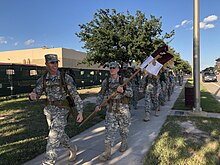 Cadets from the Aggie Band conducting a ruck march on West Campus Texas A&M Cadets conduct a ruck march training exercise.jpg