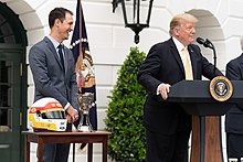 Logano with President Donald Trump on the White House south lawn in 2019 The 2018 NASCAR Cup Series Champion Joey Logano Visits the White House (46960610304).jpg