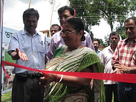 Chhaya Sarkar, a woman chair of a Panchayat Samiti (local Indian legislature) opens a new photo exhibition. The Chairperson, Bishalgarh Panchayat Samiti, Smt. Chhaya Sarkar, inaugurating the DAVP photo exhibition, at Gokulnagar, in Tripura on August 10, 2012.jpg