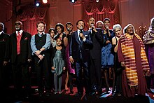 "Lift Every Voice and Sing" being sung by the family of Barack Obama, Smokey Robinson and others in the White House in 2014 The Obamas sing with Smokey Robinson, Joan Baez and others, 2014.jpg