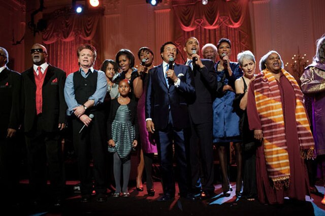 The family of Barack Obama, Smokey Robinson, and others singing "Lift Every Voice and Sing" in the White House in 2014