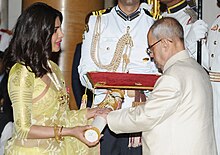 The President, Shri Pranab Mukherjee presenting the Padma Shri Award to Ms. Priyanka Chopra. The President, Shri Pranab Mukherjee presenting the Padma Shri Award to Ms. Priyanka Chopra, at a Civil Investiture Ceremony, at Rashtrapati Bhavan, in New Delhi on April 12, 2016.jpg