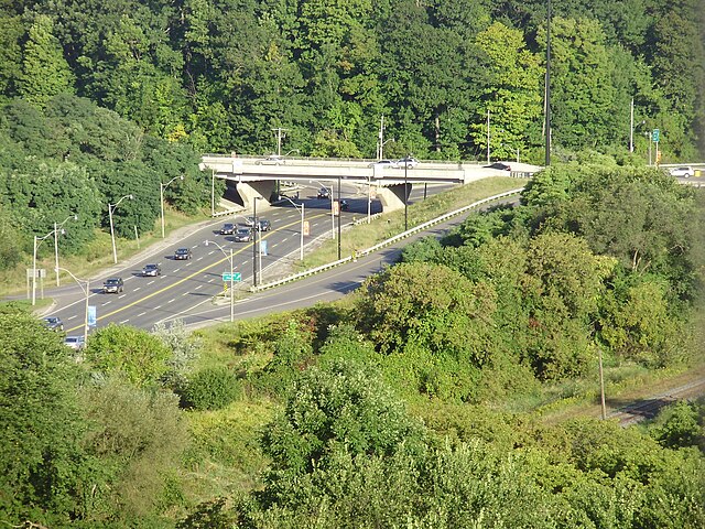 Part of Don Valley Parkway / Bloor off-ramp as it crosses Bayview Avenue in the Don Valley. Looking north along Bayview.