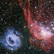 Two very different glowing gas clouds in the Large Magellanic Cloud.tiff