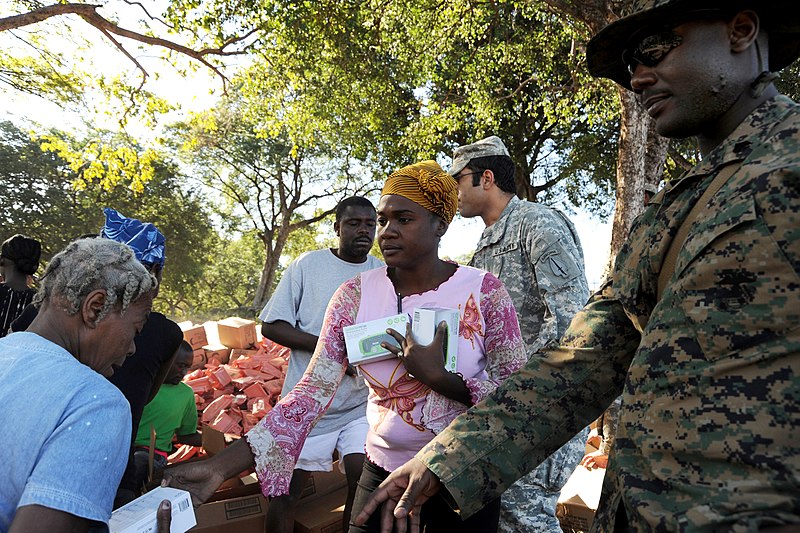 File:USMC distributes FM radios to Haitians in Port-au-Prince 2010-01-21 2.jpg