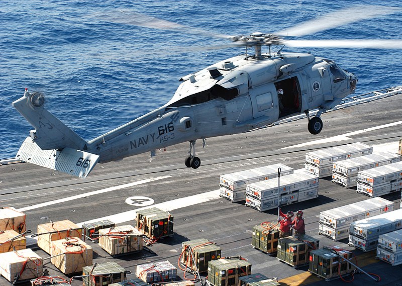 File:US Navy 040423-N-7408M-004 An SH-60F Seahawk hovers just above the flight deck of USS Enterprise (CVN 65).jpg