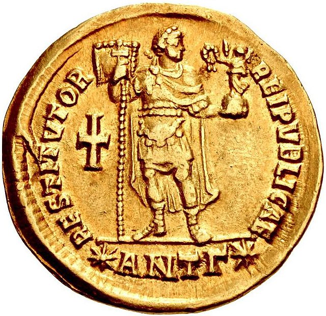 Reverse of a solidus of Valens, marked: restitutor reipublicae ("the restitutor of the Republic") and showing the emperor holding a vexillum and a glo