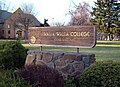 Walla Walla College sign and Peterson Memorial Library.