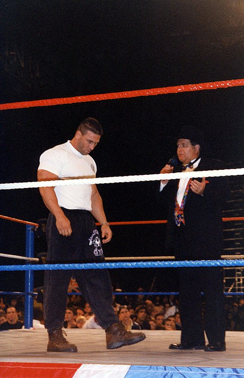 Ross was mainly used as a commentator, but occasionally hosted in-ring interviews such as here with Ken Shamrock.