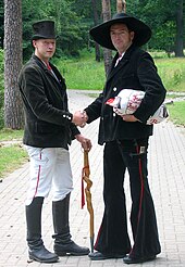 German journeymen, right: a carpenter, 2006 Zwei wandernde Gesellen, 2006.jpg