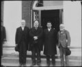 (Left to right) Robert C. Ogden, Senator William Howard Taft, Booker T. Washington and Andrew Carnegie, standing on the steps of a building, at the Tuskegee Institute's 25th anniversary LCCN2011660897.tif