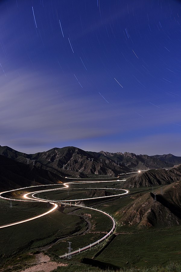Guanjiao Spiral on Qinghai–Tibet Railway at night. The route containing the spiral was replaced by a 32-km long tunnel (at the time of completion the 