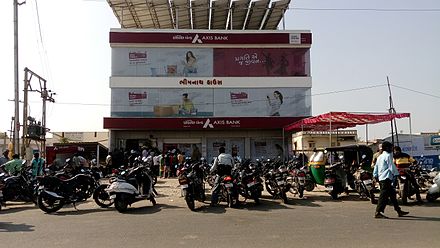 People gathered at ATM of Axis Bank in Mehsana, Gujarat to withdraw cash following deposit of demonetised currency notes in bank on 15 November 2016.