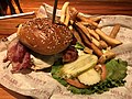 2022-04-18 19 33 17 A bacon cheeseburger with french fries at Miller's Ale House in Sterling, Loudoun County, Virginia.jpg