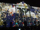 Català: Projeccions a la façana de la Casa de la Ciutat per la Mercè 2013. Pl. Sant Jaume, 1 - c. Ciutat, 2 - c. Font de Sant Miquel, 1-3 - pl. Sant Miquel, 6 (Barcelona). This is a photo of a building listed in the Catalan heritage register as Bé Cultural d'Interès Local (BCIL) under the reference 08019/744. Object location 41° 22′ 57.23″ N, 2° 10′ 38.62″ E  View all coordinates using: OpenStreetMap