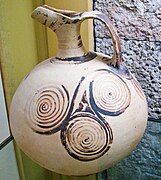 Ancient greek beaked jug decorated with triple spirals.jpg