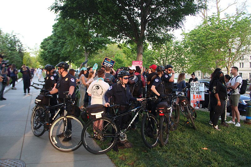 File:Anti abortion demonstration at SCOTUS May 3 2022 surrounded by police on bicycles 819.jpg