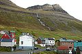 The village Árnafjørður is located between high mountains and an inlet with the same name.