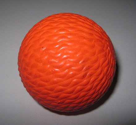 The ball used in rink bandy. The ball color is either cerise or orange