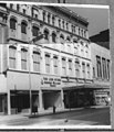 Lion Store entrance with statue lions at right, 1935