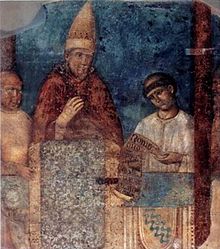 Pope Boniface VIII at the 1300 jubilee with a "Tartar cloth" in front of him, with a "rhythmic Sino-Mongolian pattern". Boniface VIII with Tartar cloth.jpg