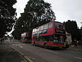 Buses seen waiting at Church Litten, Newport, Isle of Wight, running shuttle services between Newport town centre and the Bestival 2011 site.