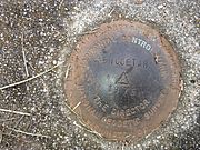 Horizontal control marker placed by the National Geodetic Survey in 1975 at the site of the tower
