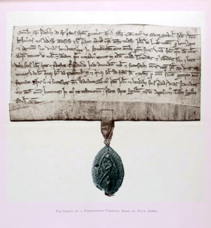 A deed and seal of Dale Abbey. The seal bears the inscription: S. Ecclesie Sancte Marie de Parco Stanlee, enclosing a half-length Madonna and Child with a half-length abbot praying beneath a trefoiled arch. Dale Abbey deed and seal 01.png