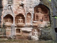 Mughal Emperor Babur demolished Gopalchal rock cut Jain Monuments. Desecrated Jain idols on the stone cliffs, Gopachal Parvat, Gwalior Fort, Madhya Pradesh.jpg