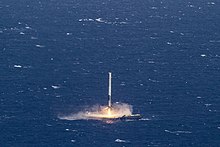 SpaceX first stage rocket returning from space to a drone ship at sea. Falcon 9 first stage landing on Droneship.jpg