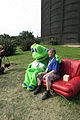 Frog and geocacher at Berliner Sofa logbook at Geocoinfest 2013 in Prague.JPG